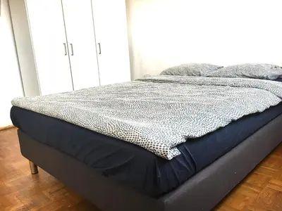 Łóżko lub łóżka w pokoju w obiekcie Stilo Dom - ul Nowowiejska