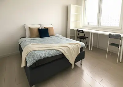 Łóżko lub łóżka w pokoju w obiekcie Stilo Dom - Plac Grunwaldzki