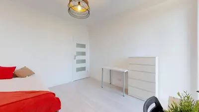 Łóżko lub łóżka w pokoju w obiekcie Stilo Dom - Plac Grunwaldzki