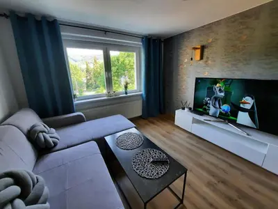 Telewizja i/lub zestaw kina domowego w obiekcie Orlicka Apartament