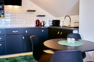 Kuchnia lub aneks kuchenny w obiekcie LAGUNA Apartament Polanica Residence 59 z klimatyzacją