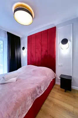 Łóżko lub łóżka w pokoju w obiekcie LAGUNA Apartament Polanica Residence 6 z garażem SPA