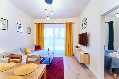 Telewizja i/lub zestaw kina domowego w obiekcie LAGUNA Apartament Polanica Residence 5
