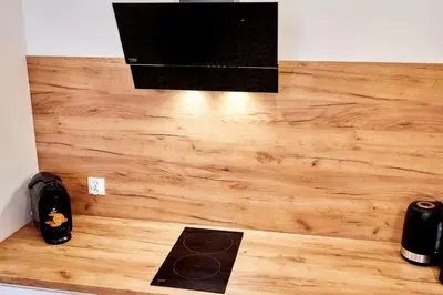 Telewizja i/lub zestaw kina domowego w obiekcie LAGUNA Apartament Polanica Residence 5
