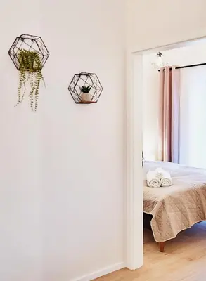 Łóżko lub łóżka w pokoju w obiekcie LAGUNA Apartament Polanica Residence 54