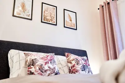 Łóżko lub łóżka w pokoju w obiekcie LAGUNA Apartament Polanica Residence 54