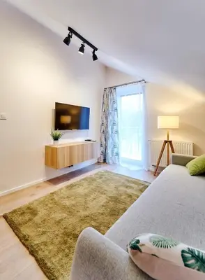 Telewizja i/lub zestaw kina domowego w obiekcie LAGUNA Apartament Polanica Residence 54