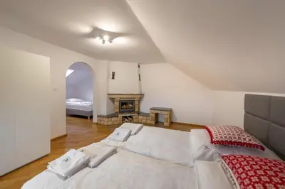 Łóżko lub łóżka w pokoju w obiekcie Apartamenty Przy Stoku Lądek Zdrój