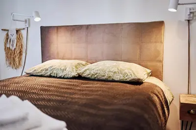 Łóżko lub łóżka w pokoju w obiekcie Blanca Apartamenty Polanica-Zdrój, Polanica Residence