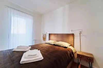 Łóżko lub łóżka w pokoju w obiekcie Blanca Apartamenty Polanica-Zdrój, Polanica Residence