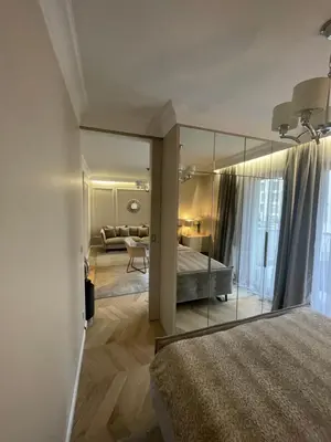 Łóżko lub łóżka w pokoju w obiekcie Beige MOOD City Apartment
