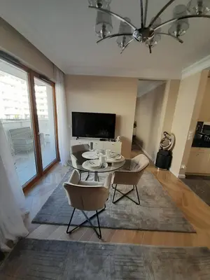 Telewizja i/lub zestaw kina domowego w obiekcie Beige MOOD City Apartment