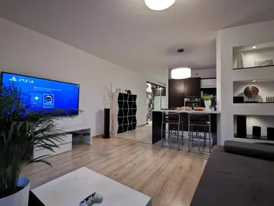 Telewizja i/lub zestaw kina domowego w obiekcie Sweet Lime Apartments Kaszubska