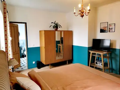 Telewizja i/lub zestaw kina domowego w obiekcie Apartament Retro