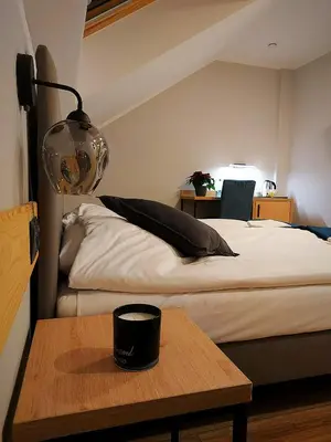 Łóżko lub łóżka w pokoju w obiekcie Pensjonat i Restauracja Hubertówka