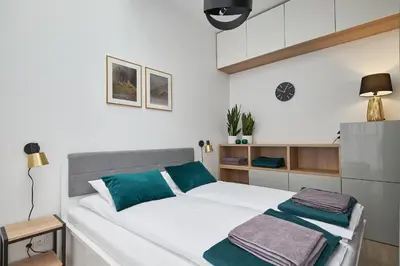 Łóżko lub łóżka w pokoju w obiekcie Green Ande