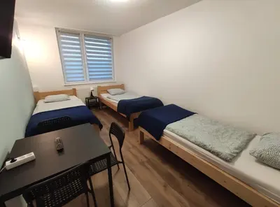 Łóżko lub łóżka w pokoju w obiekcie Night Point
