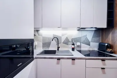 Kuchnia lub aneks kuchenny w obiekcie LAGUNA Apartament Polanica Residence 21