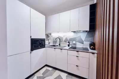 Kuchnia lub aneks kuchenny w obiekcie LAGUNA Apartament Polanica Residence 21
