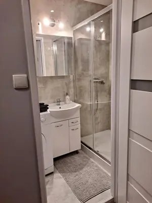 Łazienka w obiekcie Niezależny apartament przy Parku Zdrojowym 667-666-609