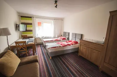 Łóżko lub łóżka w pokoju w obiekcie Na Szlaku