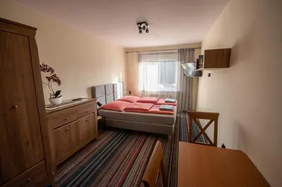 Łóżko lub łóżka w pokoju w obiekcie Na Szlaku