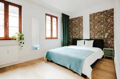 Łóżko lub łóżka w pokoju w obiekcie Apartament Rynek Więzienna