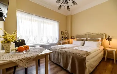Łóżko lub łóżka w pokoju w obiekcie Pokój Lidia