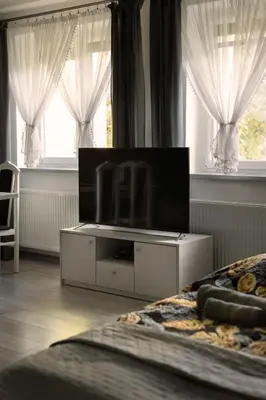 Telewizja i/lub zestaw kina domowego w obiekcie Apartament Milena