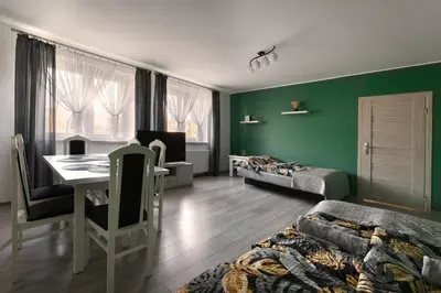 Łóżko lub łóżka w pokoju w obiekcie Apartament Milena