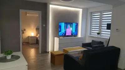 Telewizja i/lub zestaw kina domowego w obiekcie Apartament STYL