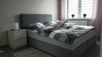 Łóżko lub łóżka w pokoju w obiekcie Apartament STYL
