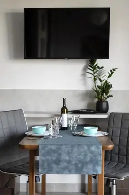 Telewizja i/lub zestaw kina domowego w obiekcie Apartament 4 pory roku