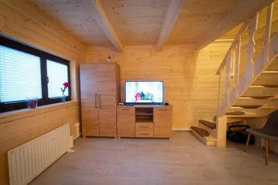 Telewizja i/lub zestaw kina domowego w obiekcie Domki na Podgórzu