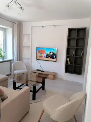 Telewizja i/lub zestaw kina domowego w obiekcie Apartament u Przewodnika Sudeckiego