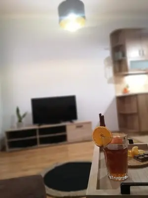 Telewizja i/lub zestaw kina domowego w obiekcie Apartament Mariacka