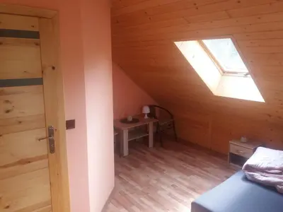 Łóżko lub łóżka w pokoju w obiekcie Apartament 