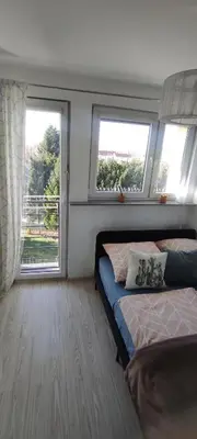 Łóżko lub łóżka w pokoju w obiekcie Apartament Ziemia Kłodzka