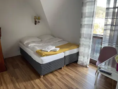 Łóżko lub łóżka w pokoju w obiekcie Agropajda