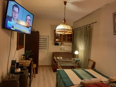 Telewizja i/lub zestaw kina domowego w obiekcie Garsoniera SOWA