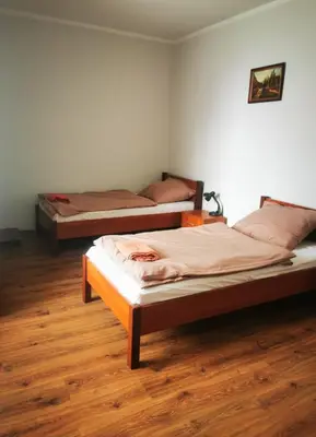 Łóżko lub łóżka w pokoju w obiekcie Hotel Stary Ratusz