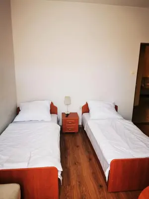 Łóżko lub łóżka w pokoju w obiekcie Hotel Stary Ratusz