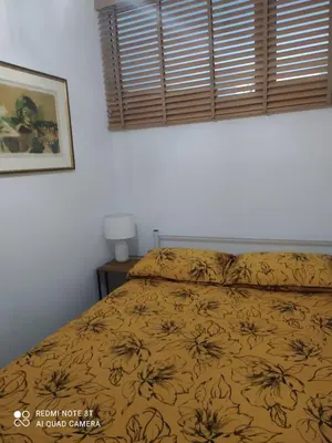 Łóżko lub łóżka w pokoju w obiekcie Apartament Miodownik