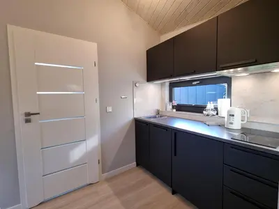Kuchnia lub aneks kuchenny w obiekcie Okno na Raj - Domki w Górach Stołowych