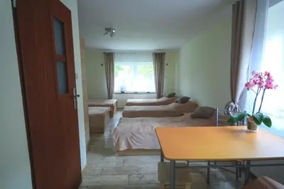 Łóżko lub łóżka w pokoju w obiekcie WILLA Jugowice
