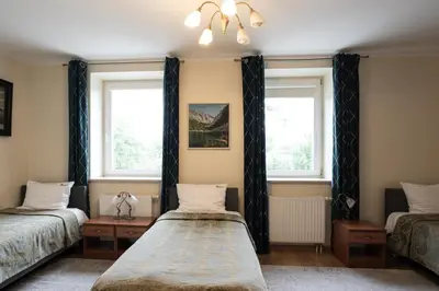Łóżko lub łóżka w pokoju w obiekcie HOTEL I RESTAURACJA BROCHÓW