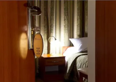 Łóżko lub łóżka w pokoju w obiekcie HOTEL I RESTAURACJA BROCHÓW