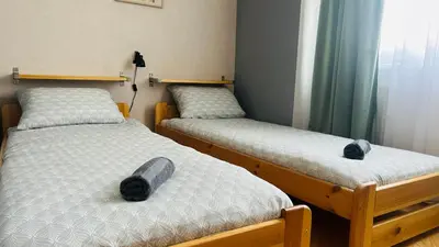 Łóżko lub łóżka w pokoju w obiekcie Apartament Słoneczny 6