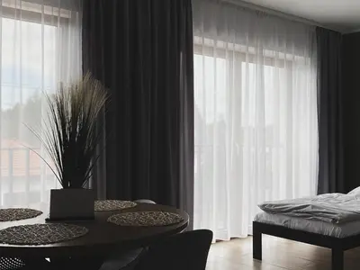 Łóżko lub łóżka w pokoju w obiekcie Tanie Noclegi Gliwice - Apartamenty Łowicka 28