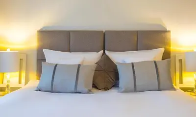 Łóżko lub łóżka w pokoju w obiekcie Hotel na Skarpie